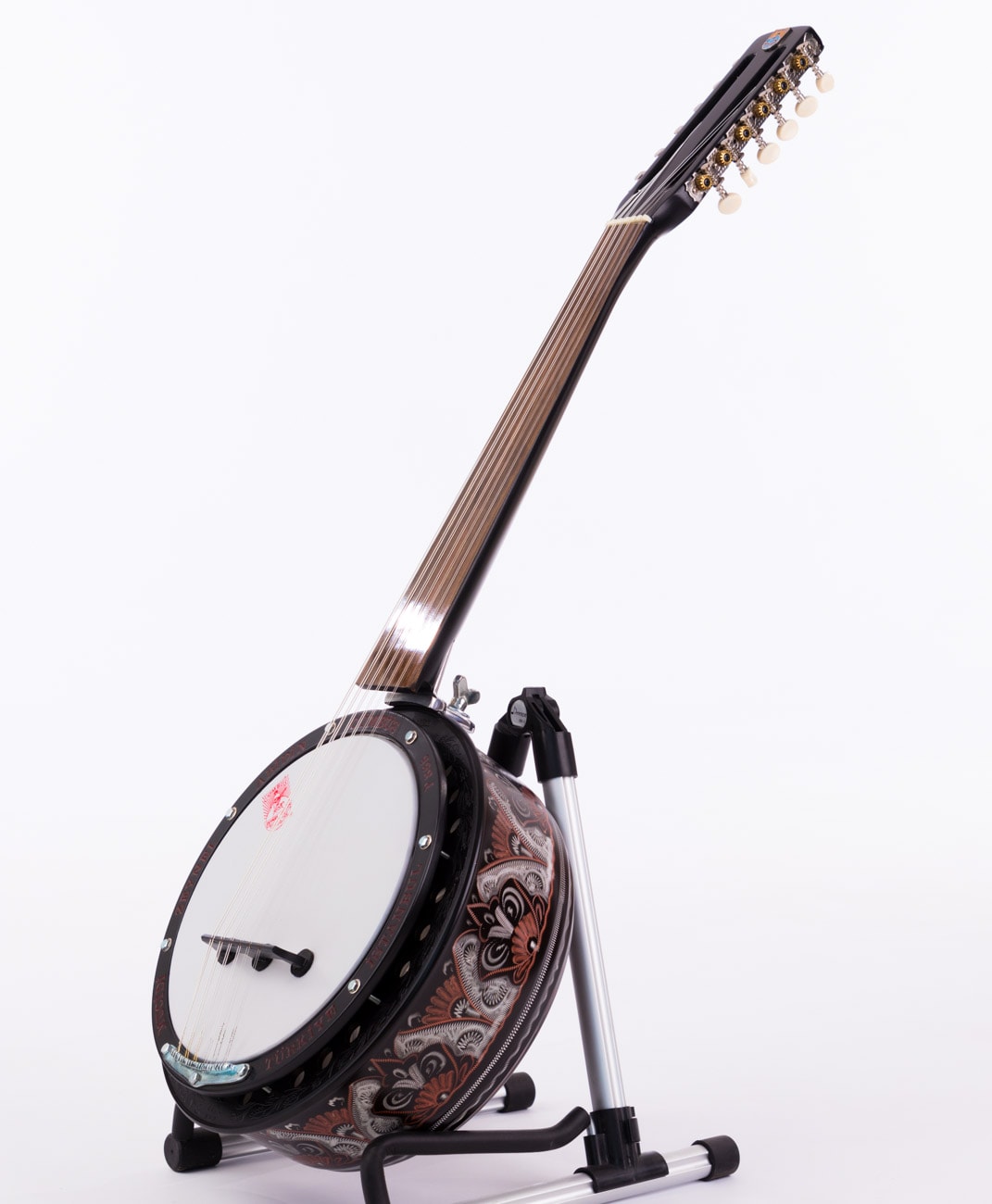 Ornately engraved cümbüş with colorful decorative body